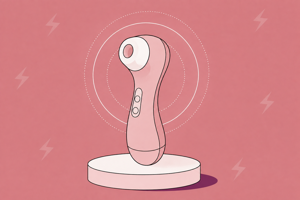 Illustration of a rose-gold air-pulse stimulator on a display stand.